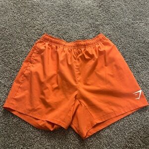 Orange Gymshark Athletic Shorts